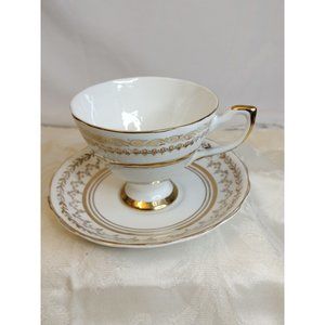 CrownFord Fotted Tea Cup & Saucer White W/Gold Trim Fine Bone China M/England